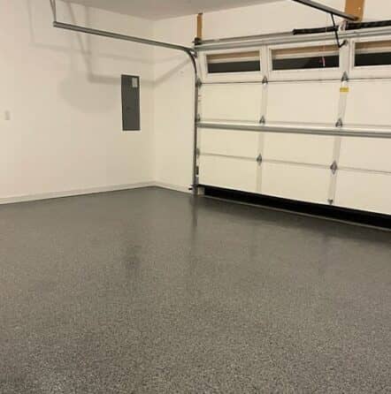 garage floor with new nightfall epoxy installed