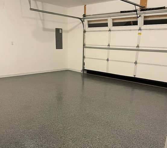garage floor with new nightfall epoxy installed