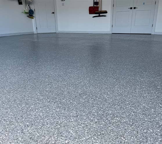 homeowner garage with smoke flake epoxy flooring