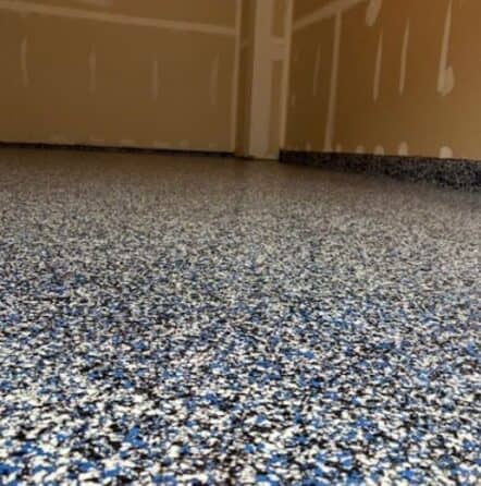 close-up of touch of blue epoxy flooring for homeowner garage close-up