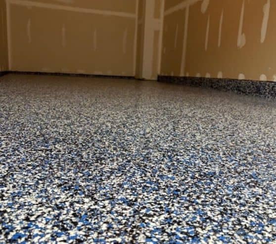 close-up of touch of blue epoxy flooring for homeowner garage close-up