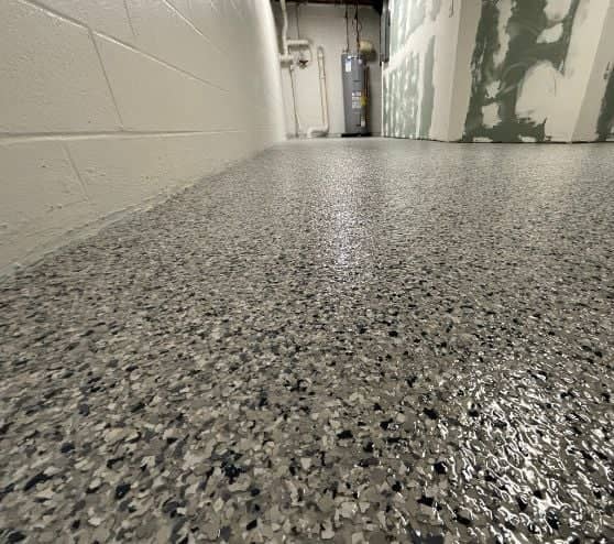 close-up of Tidal Wave Epoxy Flake Flooring for homeowner basement