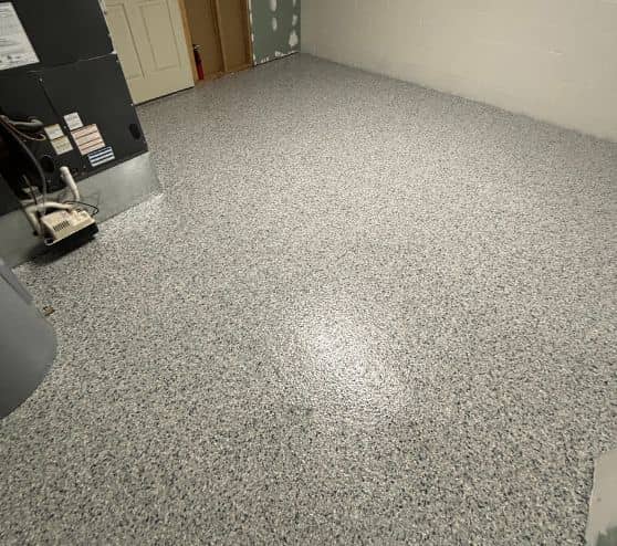 homeowner basement with Tidal Wave Epoxy Flake Flooring installed