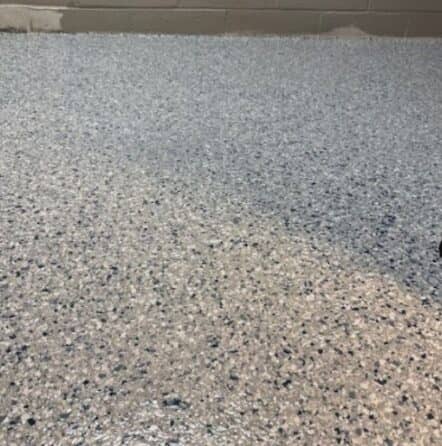 close-up of Tital Wave Epoxy Flake Flooring installed for homeowner basement