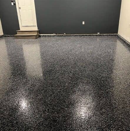 touch of blue epoxy flooring for homeowner garage
