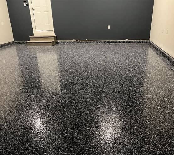 touch of blue epoxy flooring for homeowner garage