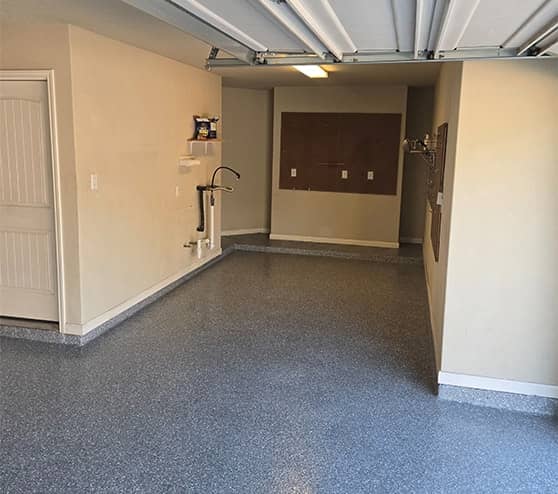 epoxy flake flooring installed for homeowner garage