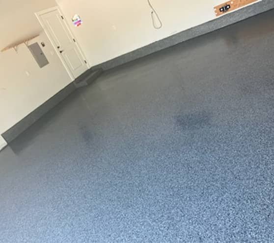 garage floor with new installed of nightfall epoxy