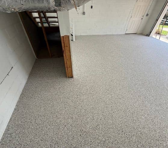 homeowner garage with new cabin fever epoxy flake flooring installed