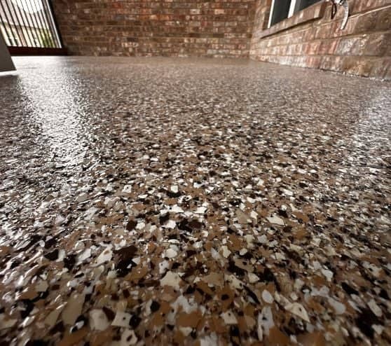cappuccino epoxy flake flooring for homeowner patio close-up