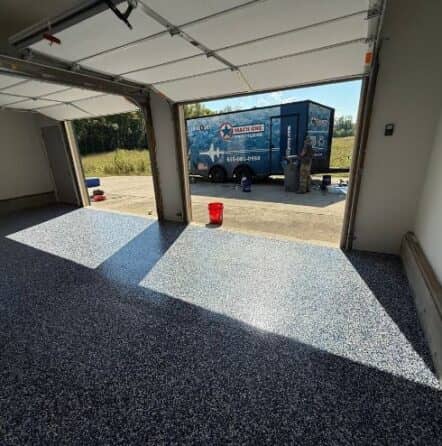 homeowner garage with freshly installed epoxy flake flooring