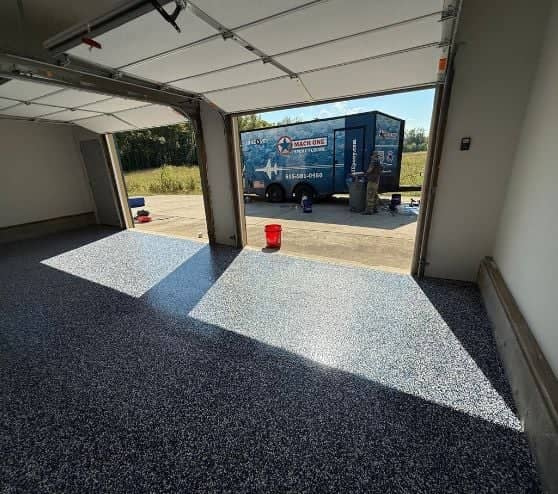 homeowner garage with freshly installed epoxy flake flooring