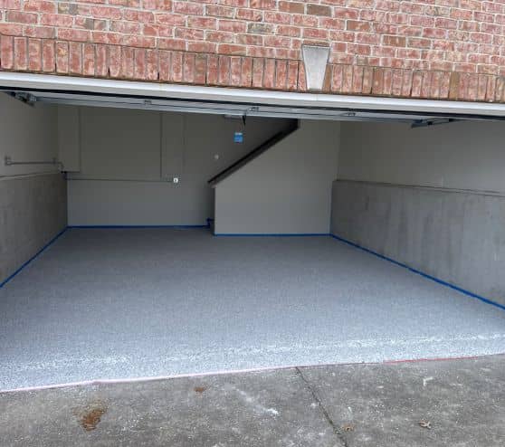 homeowner garage with new epoxy flooring