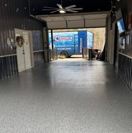homeowner garage with new flooring installed