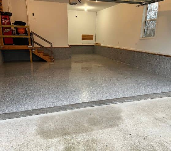 homeowner garage with new epoxy flooring installed