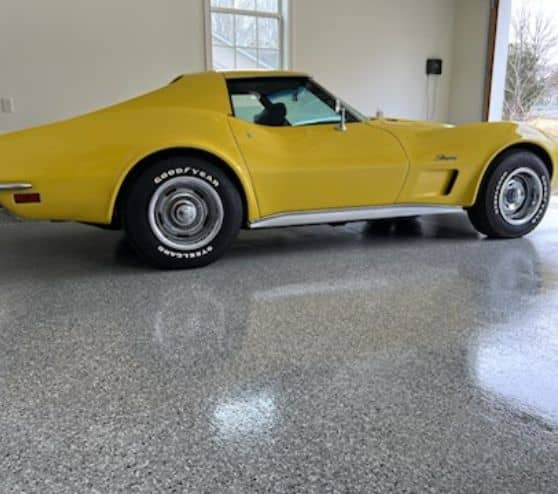 homeowner yellow corvette in garage