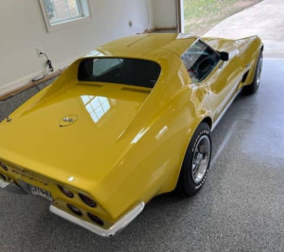 aerial view of homeowner yellow corvette