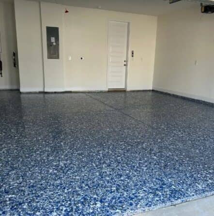blue epoxy flake flooring installed for homeowner
