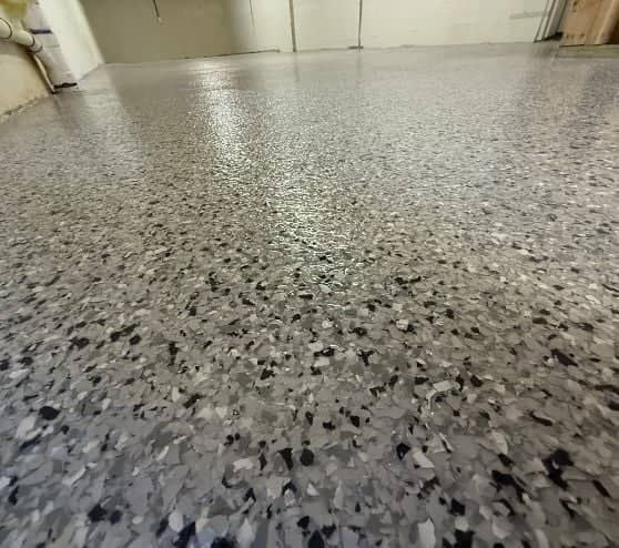 close-up of Lunar Epoxy Flake Flooring for Homeowner Basement