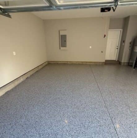 front view of homeowner garage with Lunar Epoxy Flake Flooring installed