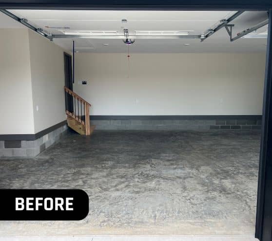 front view of homeowner garage with old concrete flooring