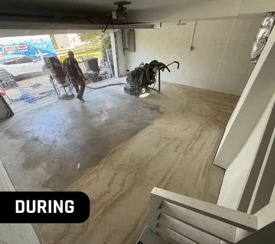during portrait of homeowner garage with new epoxy flake flooring getting installed
