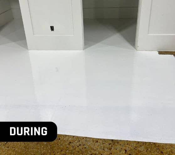 during portrait of Boutique Owner shop getting new solid epoxy flooring installed
