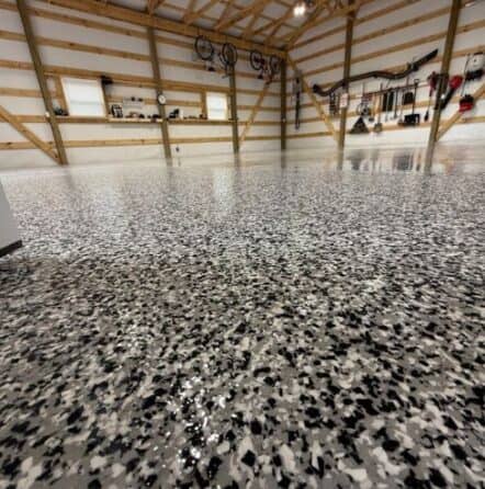 close-up of new epoxy flake flooring installed for homeowner garage