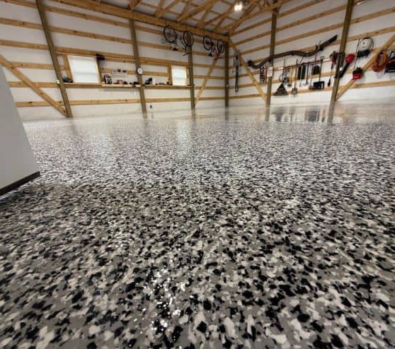 close-up of new epoxy flake flooring installed for homeowner garage