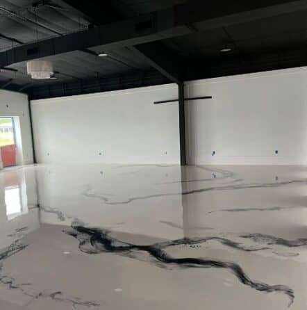 close-up of solid epoxy flooring installed for Boutique Owner
