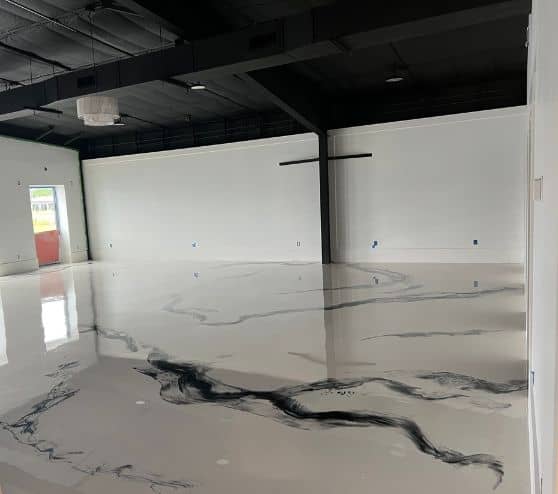 close-up of solid epoxy flooring installed for Boutique Owner