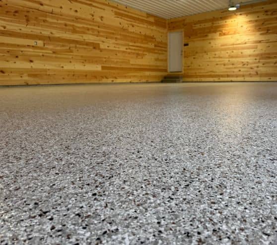 close-up of Coyote Epoxy Flake Flooring installed