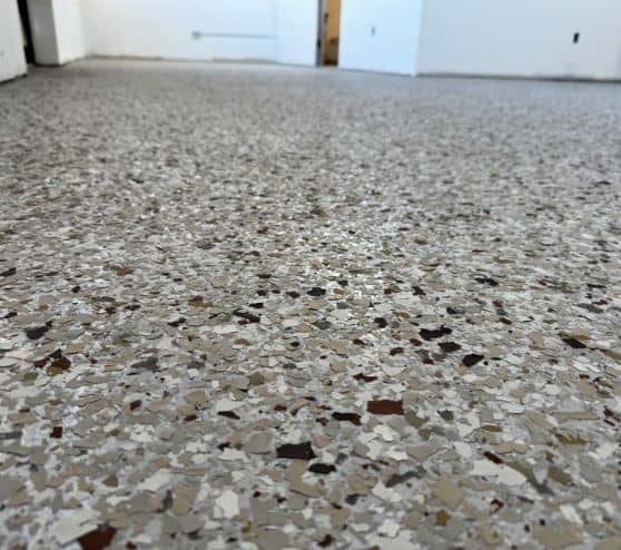 close-up of creekbed epoxy flake flooring