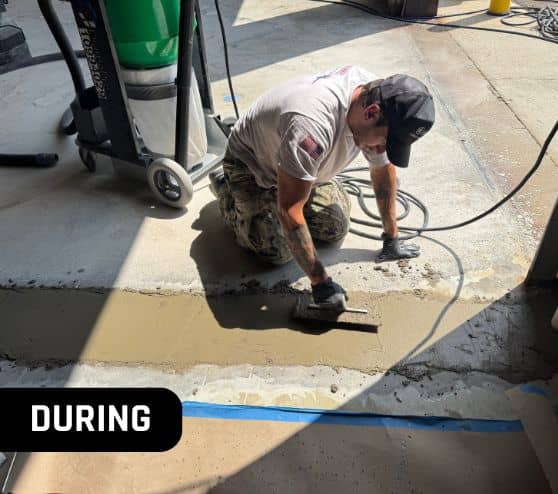 MACH ONE® employee installing new flooring for business owner warehouse