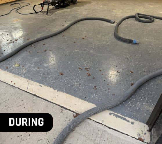 during portrait of homeowner garage before new flooring