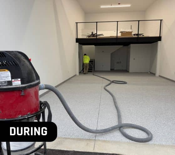 MACH ONE® employee installing Feathered Gray Epoxy Flake Flooring for homeowner garage