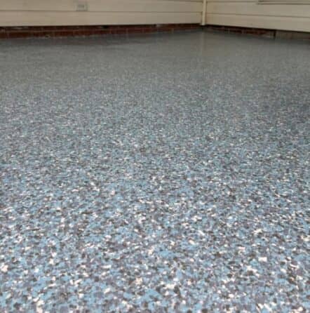 close-up of epoxy flooring installed for homeowner back porch