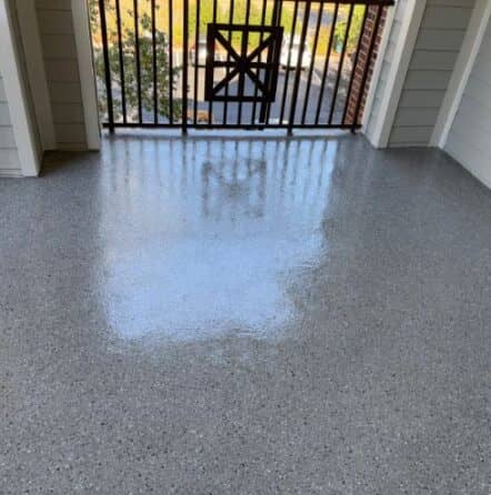 homeowner back patio with new epoxy flooring installed