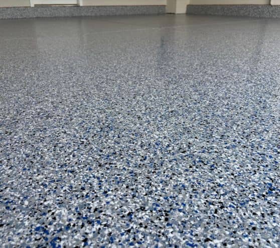 close-up of epoxy flake flooring inside of homeowner garage