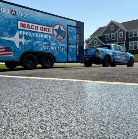 MACH ONE® truck in front of homeowner garage with trailer