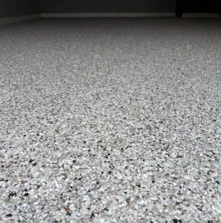 epoxy flake flooring close-up in homeowner garage