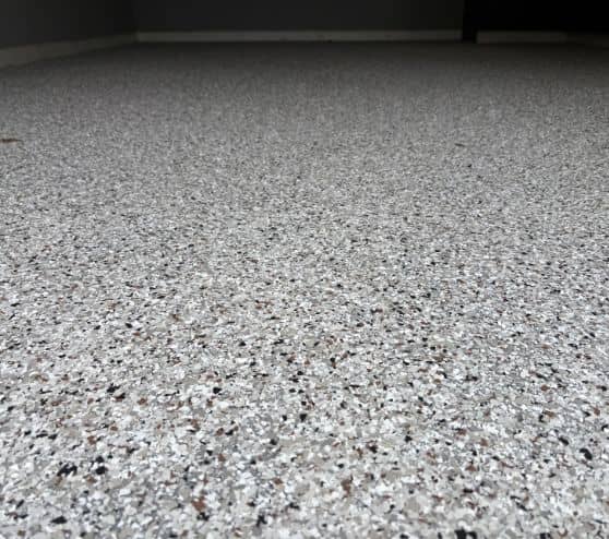 epoxy flake flooring close-up in homeowner garage
