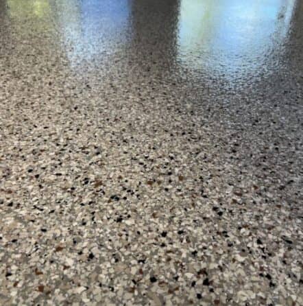 close-up of dakota grey epoxy flake flooring