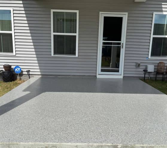 front view of exterior patio with new epoxy flake flooring