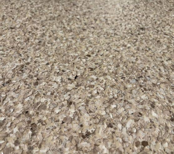 close-up of Tiki Brown epoxy flake flooring installed close-up