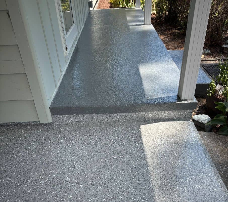 side view of porch with new epoxy flake flooring installed