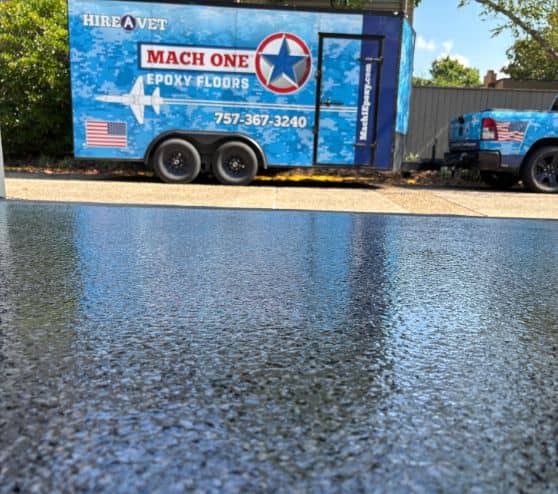 homeowner garage with grey epoxy flake flooring isntalled