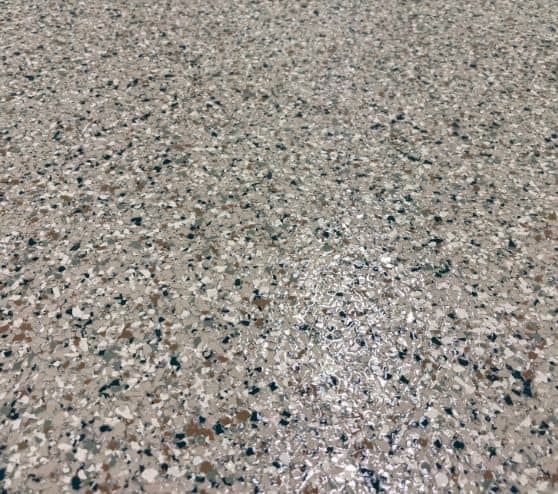 close-up of hunter flake epoxy flooring