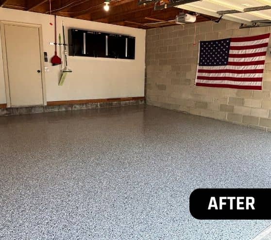 after portrait of homeowner garage with grey epoxy flake installed front view