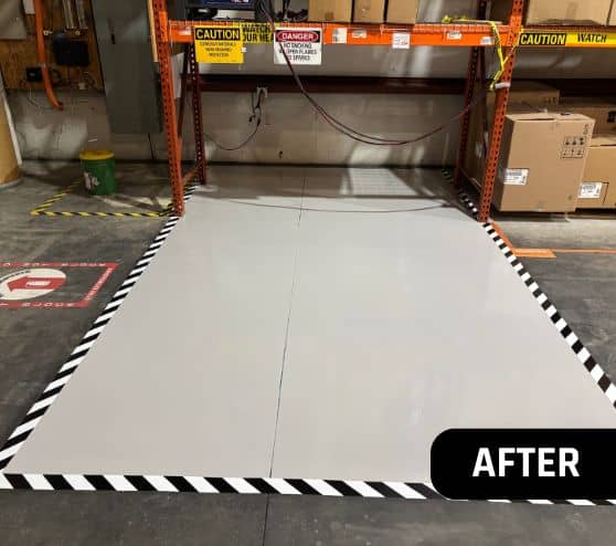 after portrait of eye wash station with new solid epoxy flake flooring